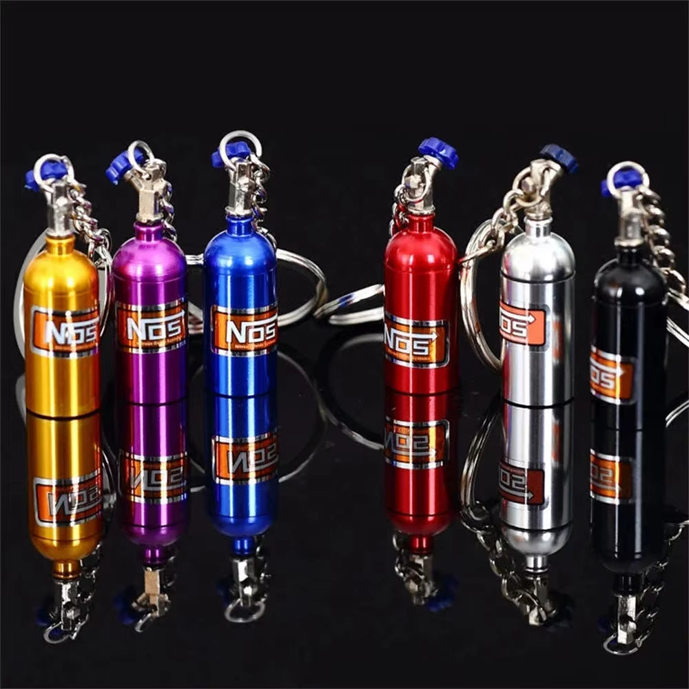 Hot Sale Creative Mini Nos Nitrogen Bottle Keychain 7 Colors Pill Box Storage Key Ring Car Handbag Phone Case Pendent Gifts